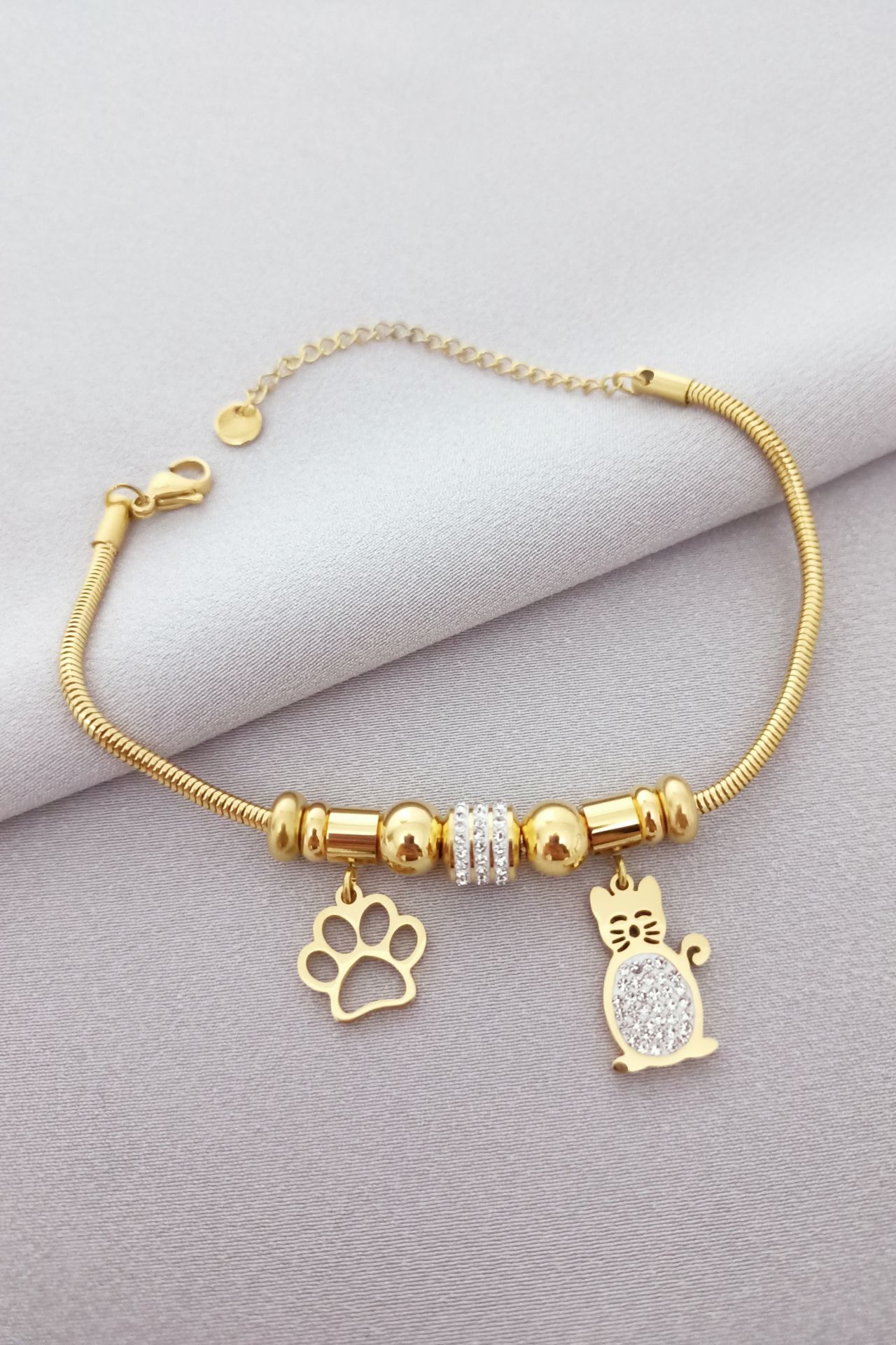 Çelik taşlı kedi pati figürlü bileklik