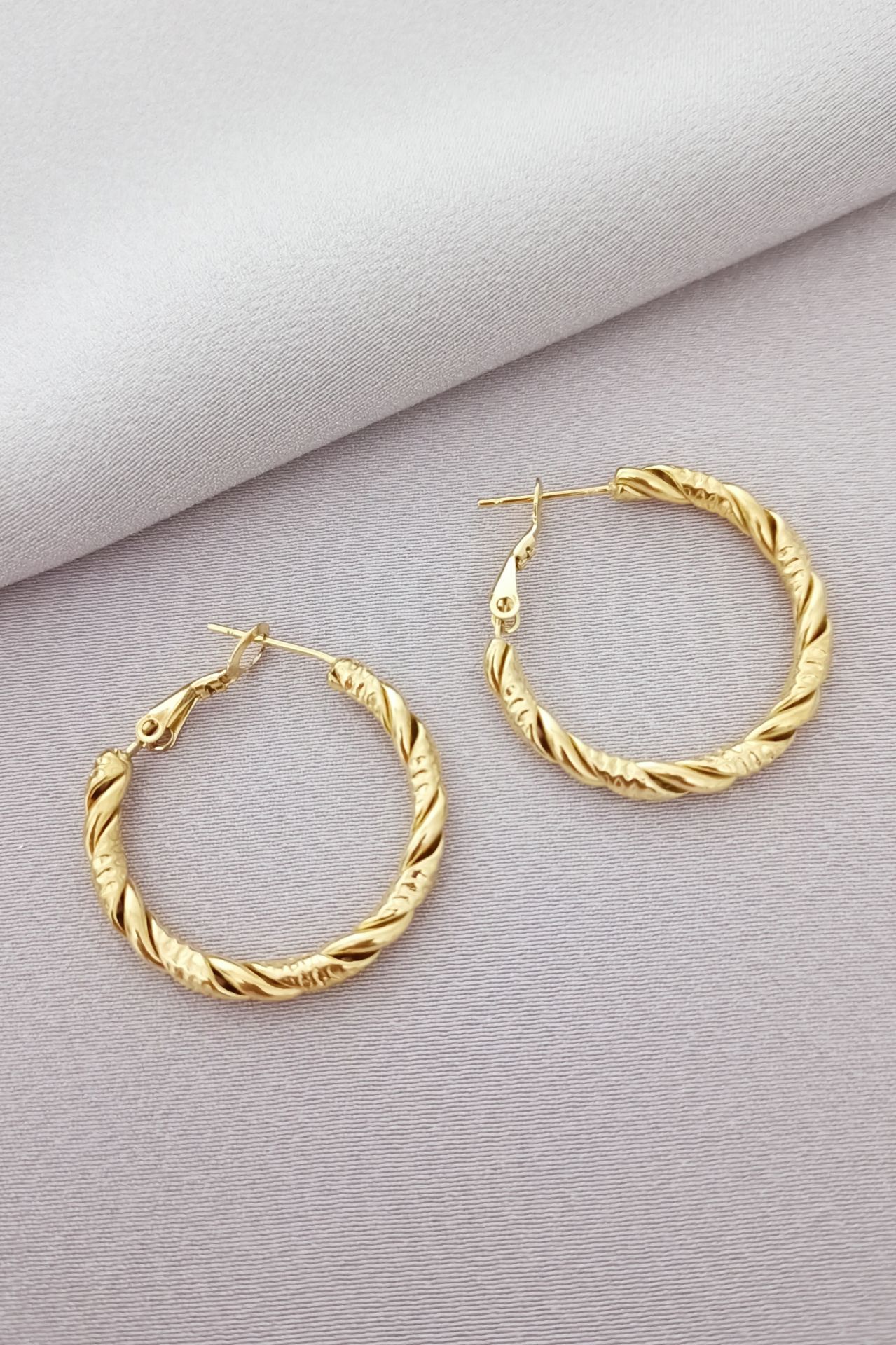 Çelik küpe gold