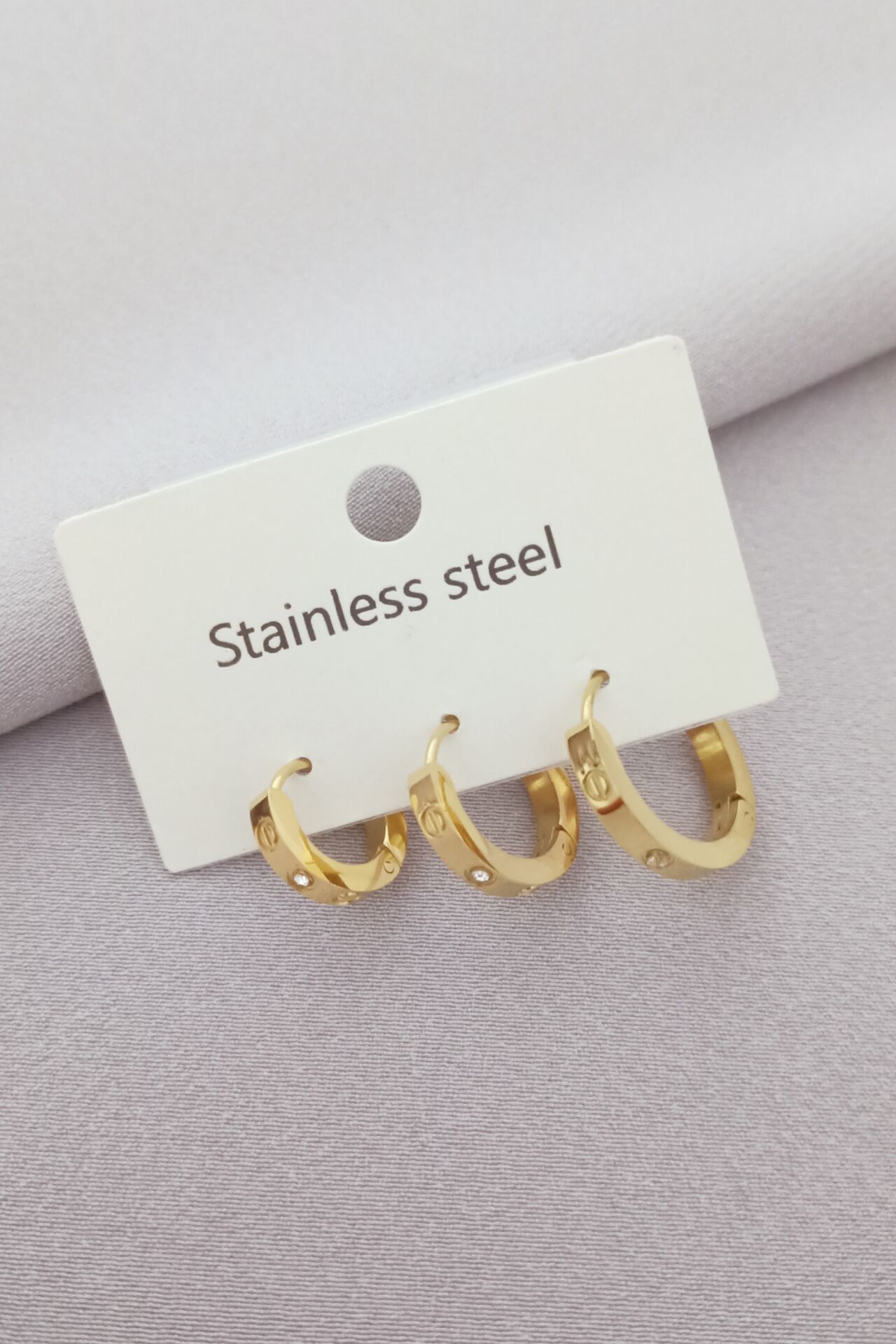 Çelik taşlı 3lü cartier küpe