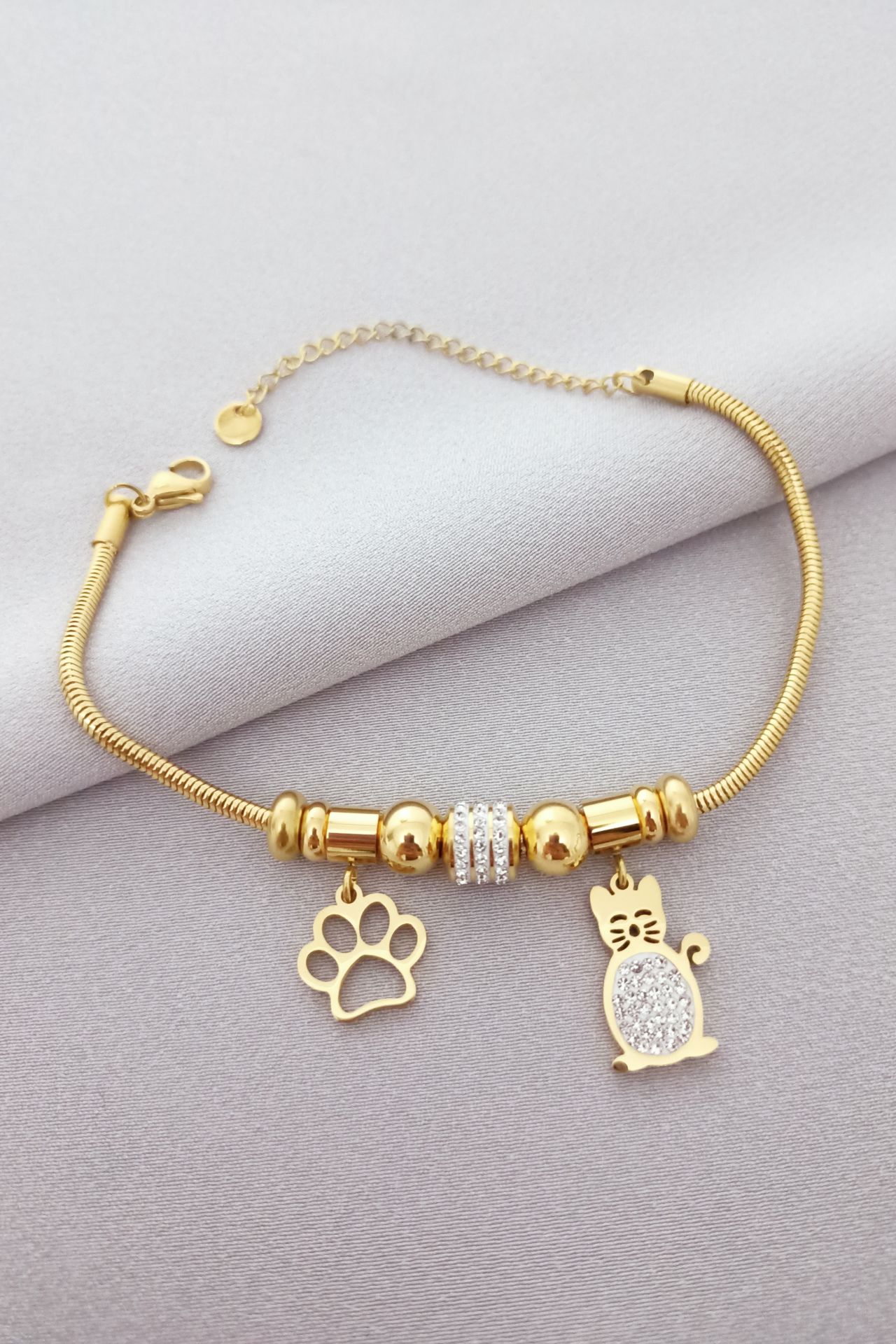 Çelik taşlı kedi pati figürlü bileklik