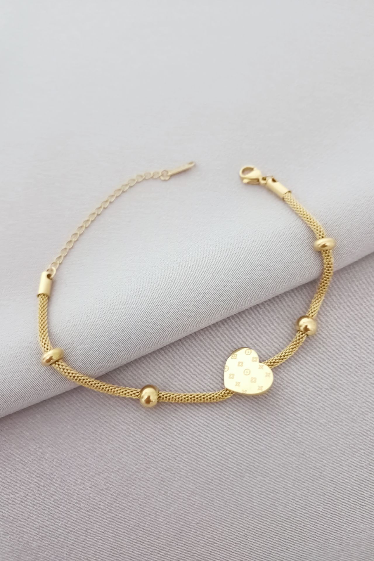 Çelik kalp bileklik gold