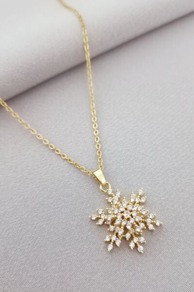 Kar tanesi dönen kolye gold