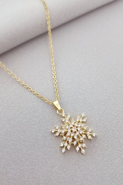 Kar tanesi dönen kolye gold
