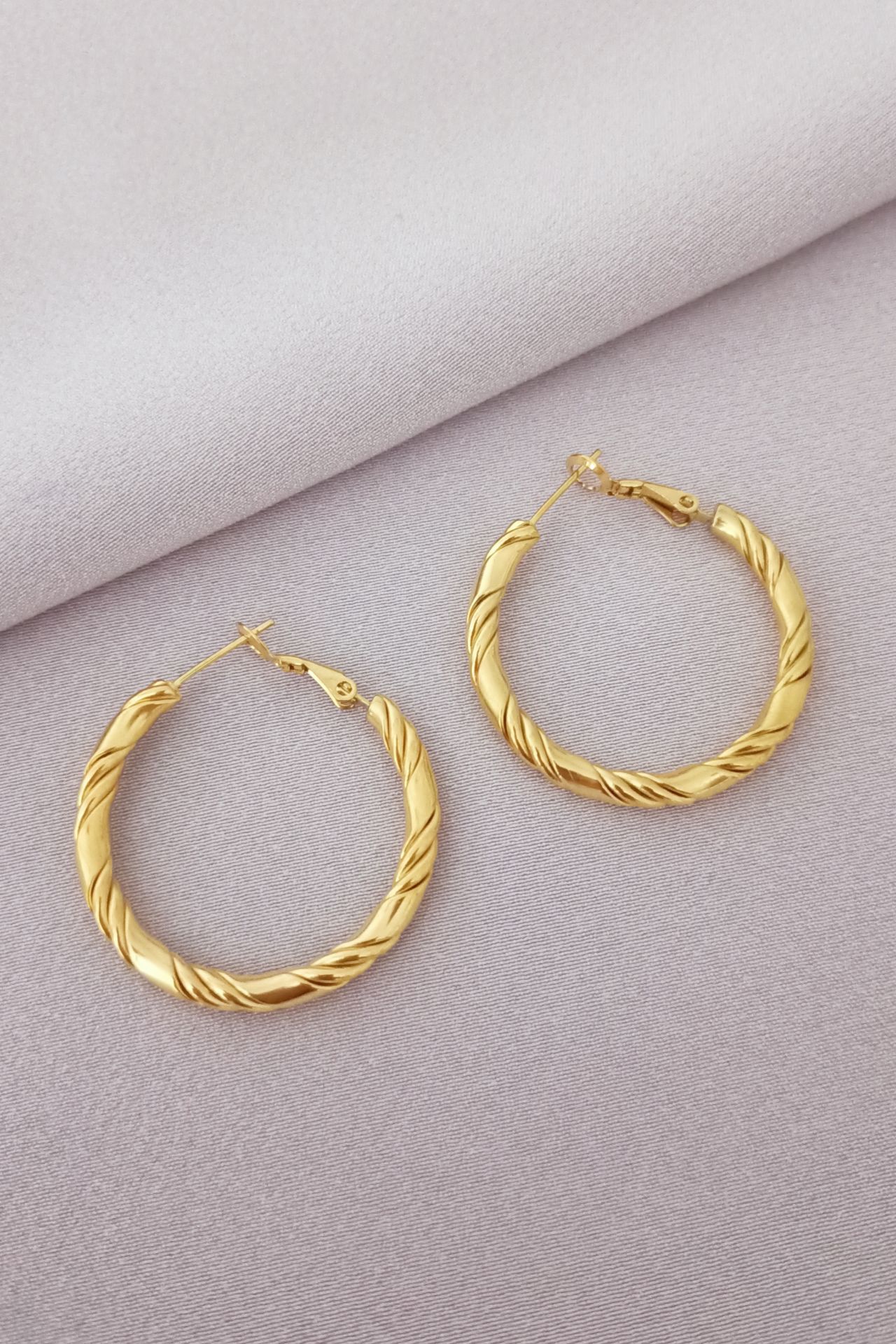 Çelik küpe gold
