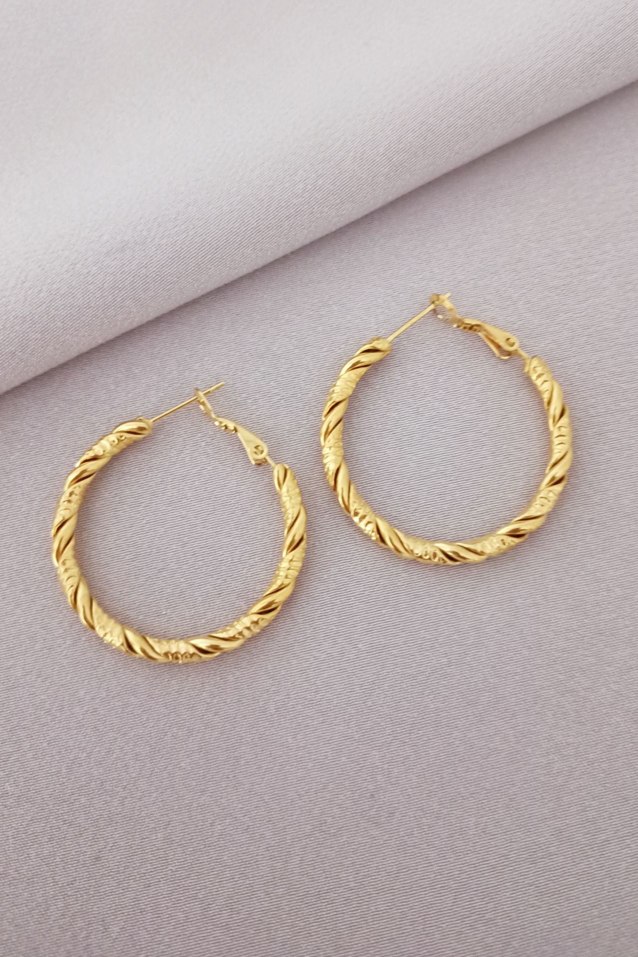 Çelik küpe gold