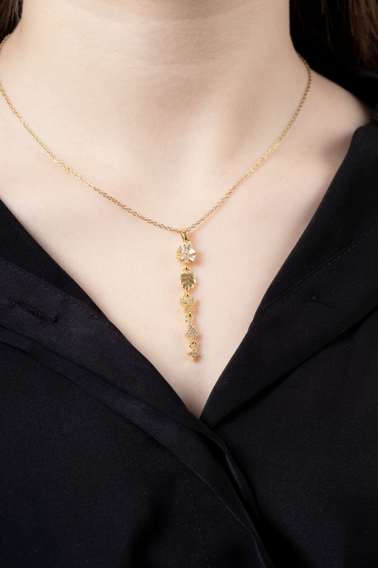 Gold Cam Çiçek Yaprak Motif Y Kolye